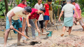 The voluntary organisation Purbo Singur Notun Kuri Club raised around Tk 1 lakh from locals who work abroad and well-off residents to buy bricks, sand and other materials. Photo: Star
