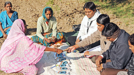 Microfinance was designed to provide financial services to low income people typically excluded from traditional banking. Photo: AFP