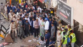 Rescue personnel at the site of the five-storey building collapse in Delhi’s Satya Niketan. The death toll rose to seven today, while 12 people have been rescued so far. Photo: The Statesman