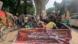 Around 100 candidates took position on the road in front of Shahbagh Police Station. Photo: Star
