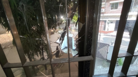 The attack shattered windowpanes, scattering broken glass across the drawing room. Photo: Star
