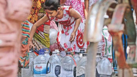 People collecting Wasa water