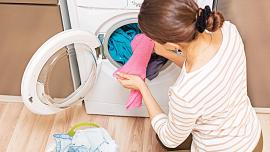 lady-taking-clothes-out.jpg
