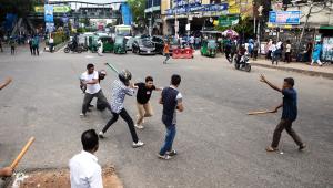 Quota protest violence: Protestor being beaten