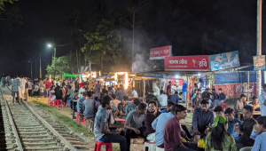 Students right by the stalls at the CU Railway Station