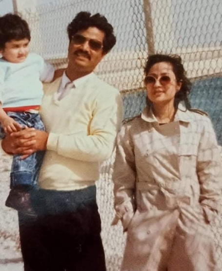 Mili Basher and Masum Basher pose with their daughter Nabila Basher, then three years old, in Bahrain in 1989